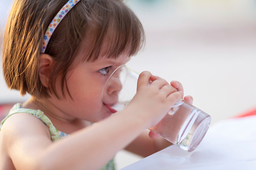 Water is one of the best healthy drinks for children.